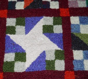 Pinwheel rug rehooked